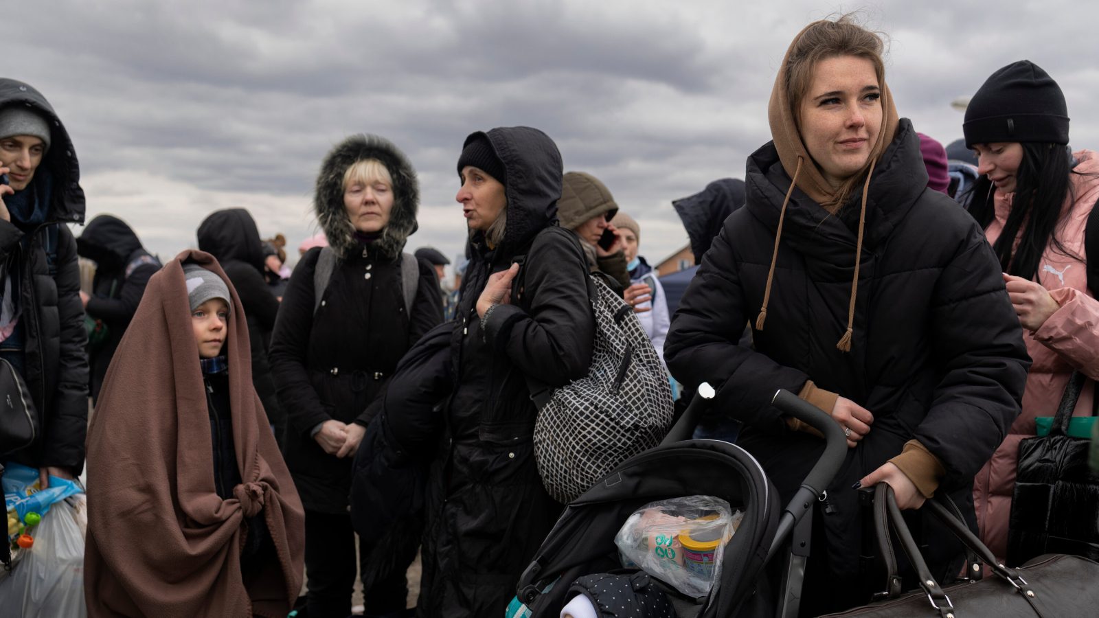 While Men Fight for Their Land in Ukraine, Their Families Try to Survive in a Foreign Country